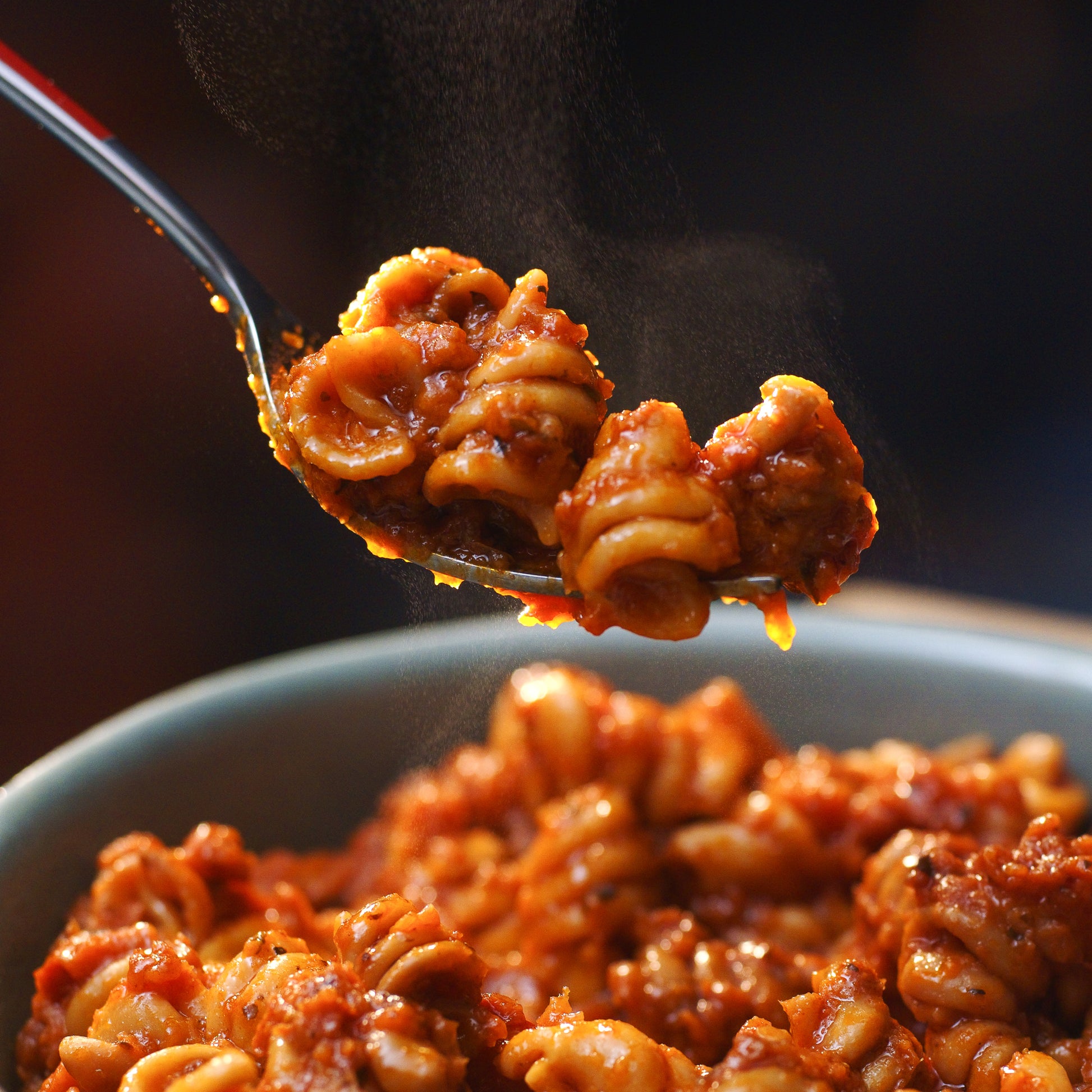 Spicy Tomato Pasta on fork - Eat Proper Good