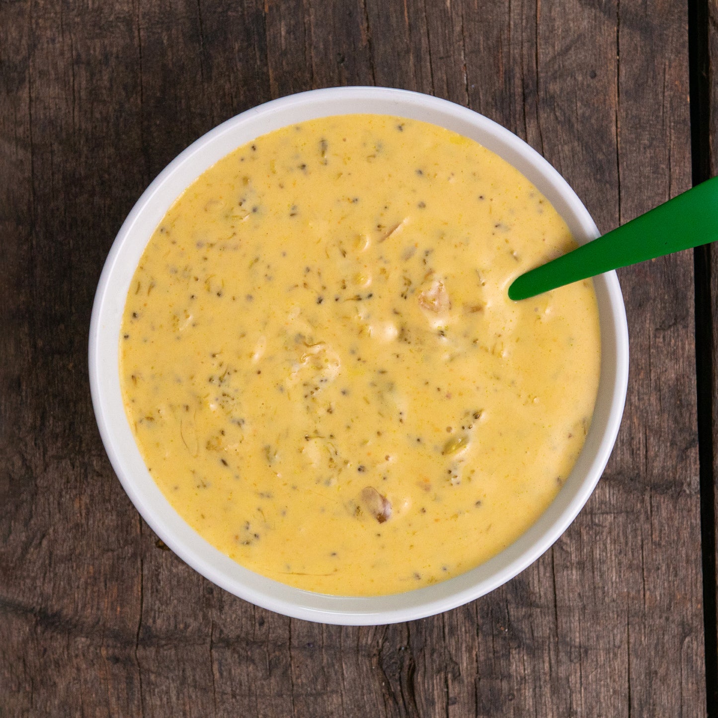 Broccoli Cheddar Soup in Bowl with Happy Spoon - Eat Proper Good