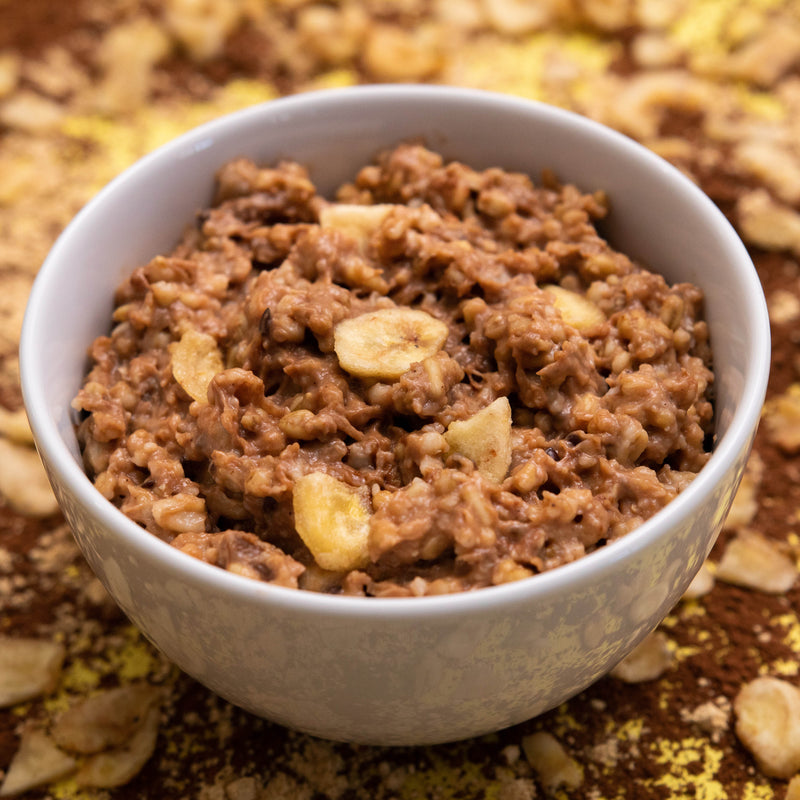 Choc, Peanut Butter & Banana Oatmeal in Bowl - Eat Proper Good