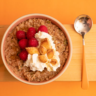 Decorated Pumpkin Pie Oatmeal in Bowl with Happy Spoon - Eat Proper Good