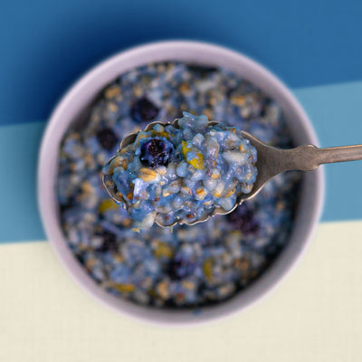 Blueberry & Coconut Oatmeal Zoomed in with Spoon - Eat Proper Good